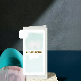 A greeting card with a white background, green border, and the Palestinian flag in the top-left corner, with the text 'As salamu alaykum' in blue. The card is displayed on a textured beige block against a dark gray and blue background.